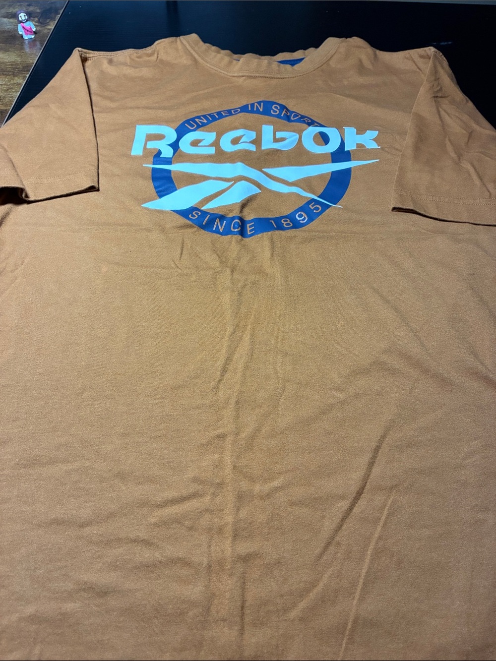 Reebok Tan Short Sleeve Tee with Blue & White Logo
